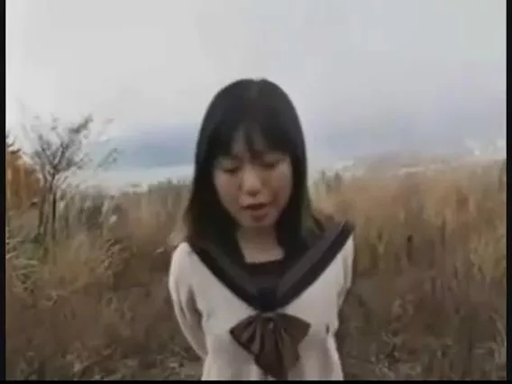 Japanese girl pooping and farting in open field