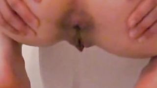 Girl with glasses pooping
