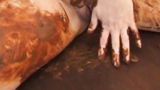 Gorgeous chubby Milf covered in shit