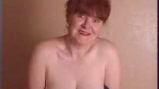 Middle aged pooping in her fishnet