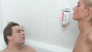 Blonde girl pees on her boyfriend