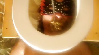 Piss and shit on a human toilet