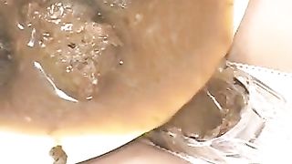 Smearing shit on her body