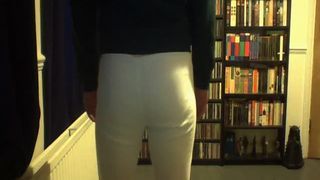 Shit in her white pants
