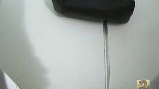 Nerd girl in a public bathroom