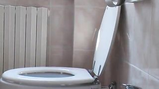 Shitting over the toilet