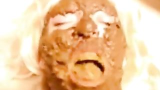 smearing poop on her face fresh from the ass