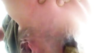 Close up of sexy babe shitting slowly and hard