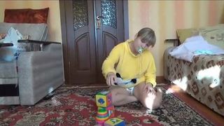 Russian girl shitting in diapers