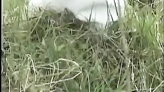 Blonde milf peeing in nature