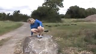 Two girls peeing by turn