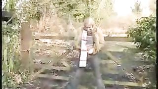 Peeing on wooden fench