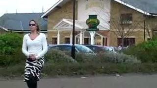 Peeing behind a metallic container