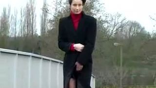 Peeing on a concrete bridge