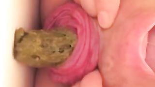 Smearing shit on her pussy