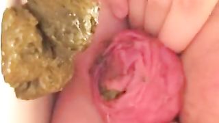 Smearing shit on her pussy