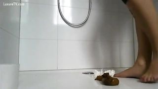 Long turd from a beautiful ass