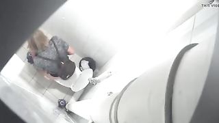 Spying on a blonde milf shitting