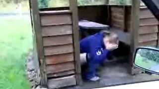 Shitting in a wooden outdoor house