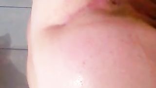 Chunky babe doing enema