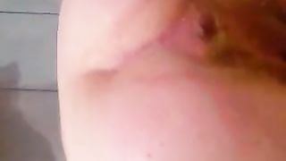 Chunky babe doing enema