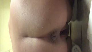 She's pooping in doggystyle