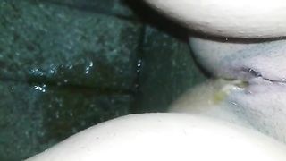 Peeing behind buildings