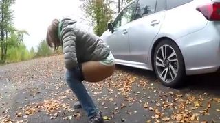 Peeing behind a parked car