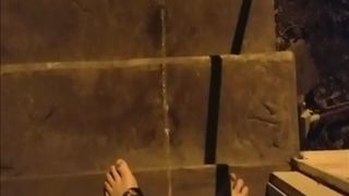 She's peeing outdoor