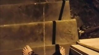 She's peeing outdoor