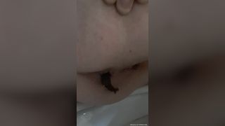 Splendid girl pooping in close up