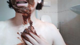 Rubbing shit on her face
