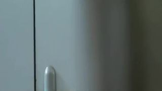 Shaved girl shitting over toilet