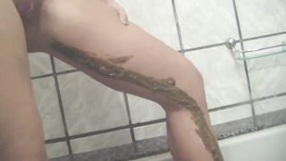 Blonde milf masturbates with fresh crap