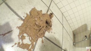 Brown haired girl shitting slowly