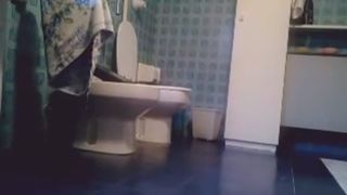 Spying on sexy teen shitting