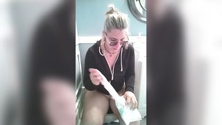 Blonde babe shitting in toilet slowly