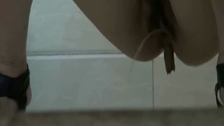 Chinese girl pooping in public bathroom