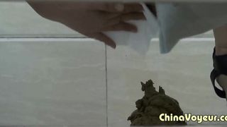 Chinese girl pooping in public bathroom