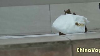 Chinese girl pooping in public bathroom