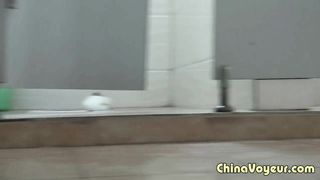 Chinese girl pooping in public bathroom