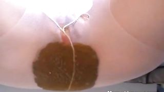 Filled white pantyhose with a lot of shit