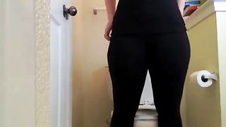 Nice girl shitting over toilet