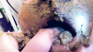 Rubbing poop on friend's face