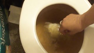 Playing with her big turds