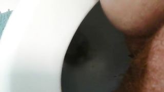Hairy babe shitting and peeing