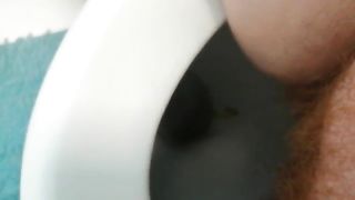 Hairy babe shitting and peeing