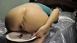Blonde babe shitting on a plate