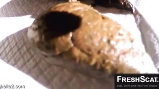 Fingering pussy while pushing monster turd