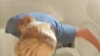 Blonde babe shits in toilet